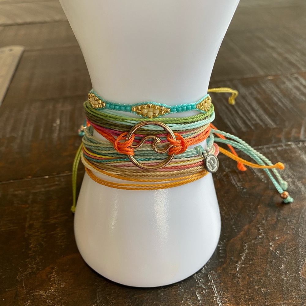 Multicolor Stackable Wax Cord Bracelets with at least one Pura Vida